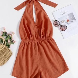 Orange open back romper NWOT